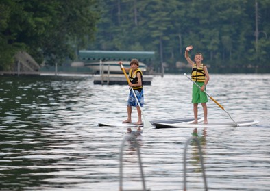 boys-paddle-board